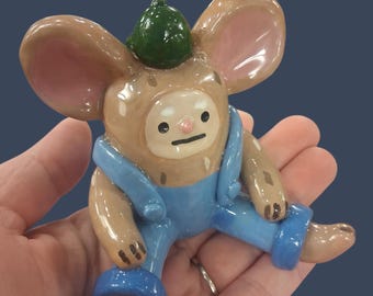 Figura de arcilla de Tuck el Ratón