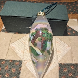 Hand Blown Winter Scene Glass Teardrop Ornament.