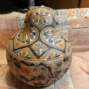 Peruvian Hand Carved Painted Gourd Rattle.