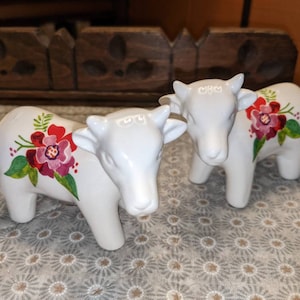 Farmhouse Style White Cow with Pink and Red Flowers Salt and Pepper Shakers.