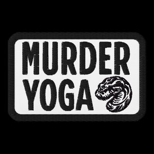 May include: Black and white embroidered patch with the text "MURDER YOGA" and a stylized image of a skull.
