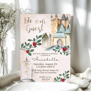 This printable invitation features a Beauty and the Beast fairytale theme with a watercolor style castle in the distance, and a magical gold rose encased in the bottom corner. Red roses grow around the text portion of the invite.
