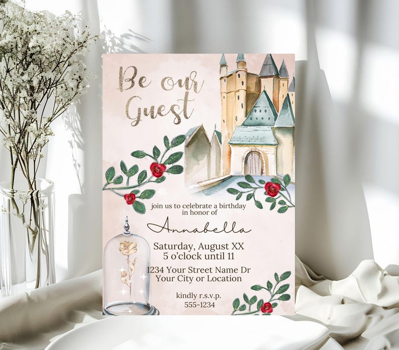 This printable invitation features a Beauty and the Beast fairytale theme with a watercolor style castle in the distance, and a magical gold rose encased in the bottom corner. Red roses grow around the text portion of the invite.