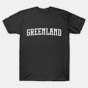 May include: Black t-shirt with white text that reads "GREENLAND" in a collegiate font.