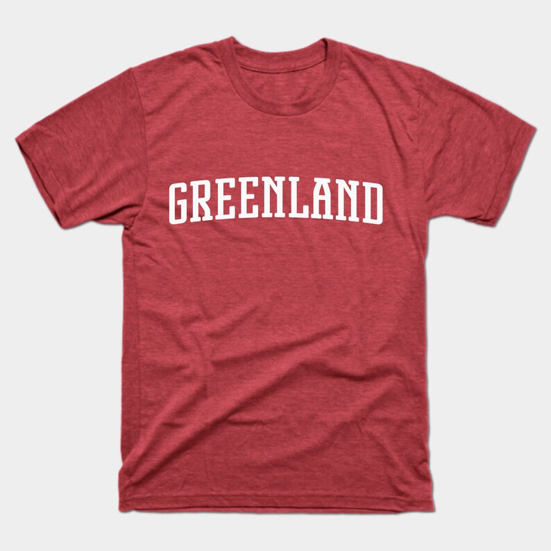 May include: A red t-shirt with the word "GREENLAND" printed in white on the front.