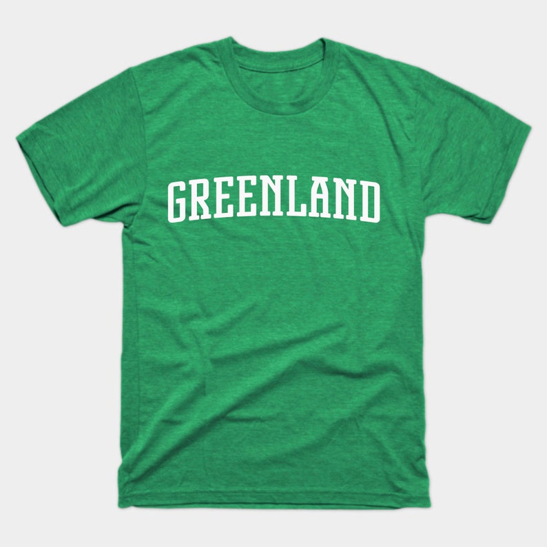 May include: A green t-shirt with the word "GREENLAND" printed in white on the front.