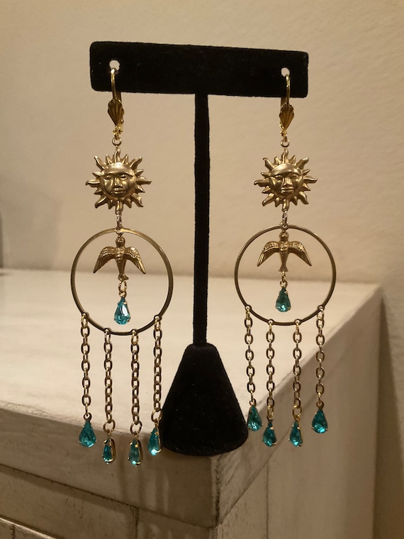 Dangling earrings. Brass with crystals.