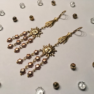 Stunning GUIDING LIGHT earrings, dangle earrings, sun earrings, hand earrings, statement earrings