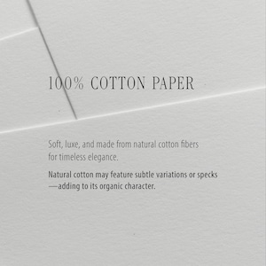 May include: A stack of white paper sheets with the text 100% COTTON PAPER, Soft, luxe, and made from natural cotton fibres for timeless elegance. Natural cotton may feature subtle variations or specks&mdash;adding to its organic character.
