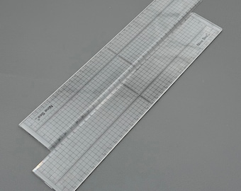 Transparent ruler with a stainless steel strip on one side 30cm