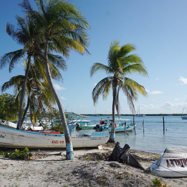 Boats on the beach of Isla Mujeres Mexico