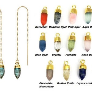 May include: A pair of gold chain earrings with a selection of gemstone charms. The charms are teardrop shaped and come in colours such as blue, green, pink, red and brown.