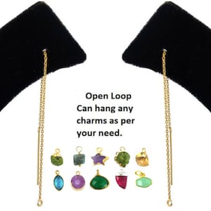 May include: Gold open loop earring with a chain that can be used to hang charms. The image shows a variety of charms, including green, blue, purple, and red gemstones.
