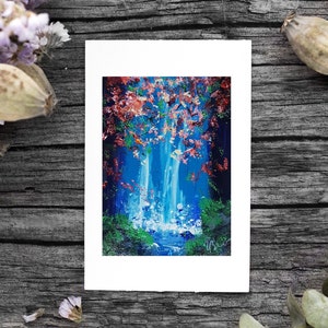 May include: A painting of a waterfall in a forest. The waterfall is blue and white, and the forest is green and brown. There are pink flowers in the trees. The painting is on a white background.