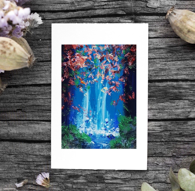 May include: A painting of a waterfall in a forest. The waterfall is blue and white, and the forest is green and brown. There are pink flowers in the trees. The painting is on a white background.