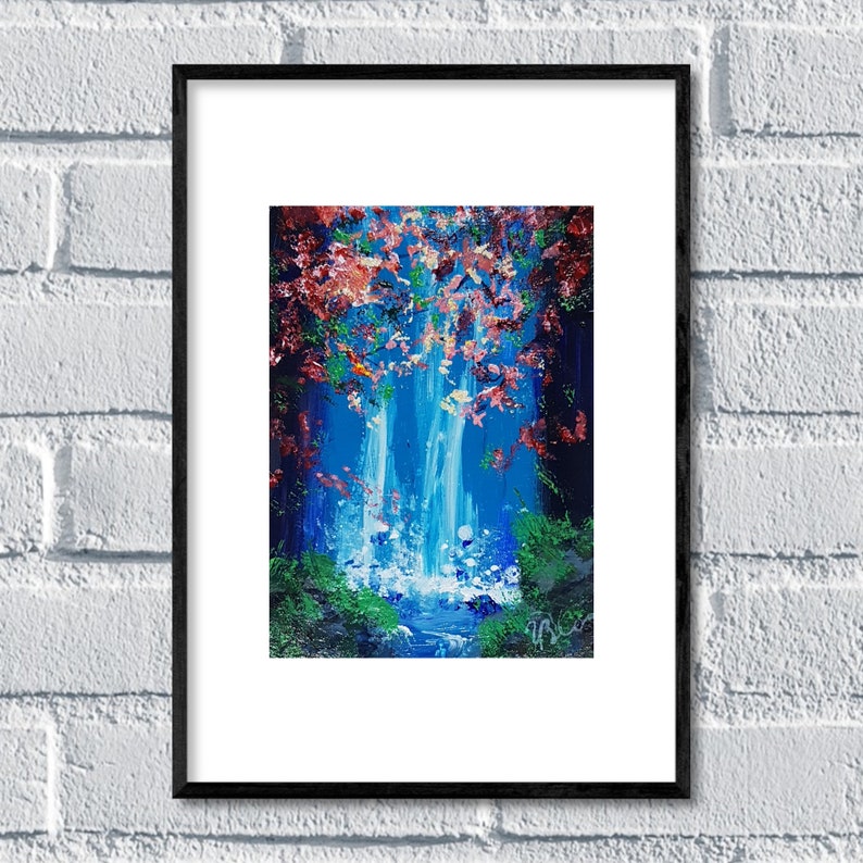 May include: A framed painting of a waterfall in a forest. The waterfall is blue and white, and the forest is green and red. The painting is framed in black.