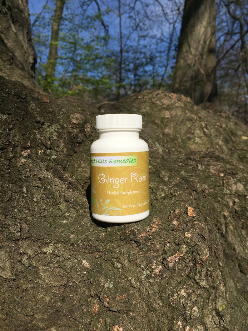 May include: White bottle of West Hills Remedies Ginger Root Herbal Supplement with a yellow label. The bottle contains 60 vegetarian capsules.