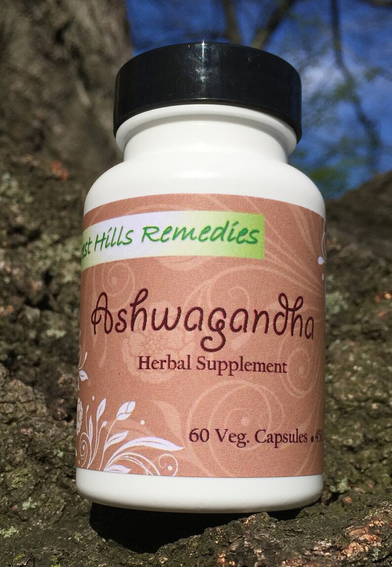May include: A brown bottle with a white label that says "West Hills Remedies Ashwagandha Herbal Supplement 60 Veg. Capsules"