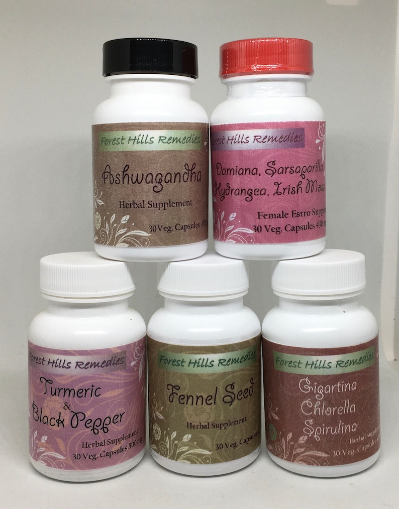 May include: Six white bottles with black lids and labels. The labels are pink and green with floral designs. The bottles contain herbal supplements. The labels read: Ashwagandha, Damiana, Sarsaparilla, Hydrangea, Irish Moss, Turmeric & Black Pepper, Fennel Seed, Gigartina Chlorella Spirulina.