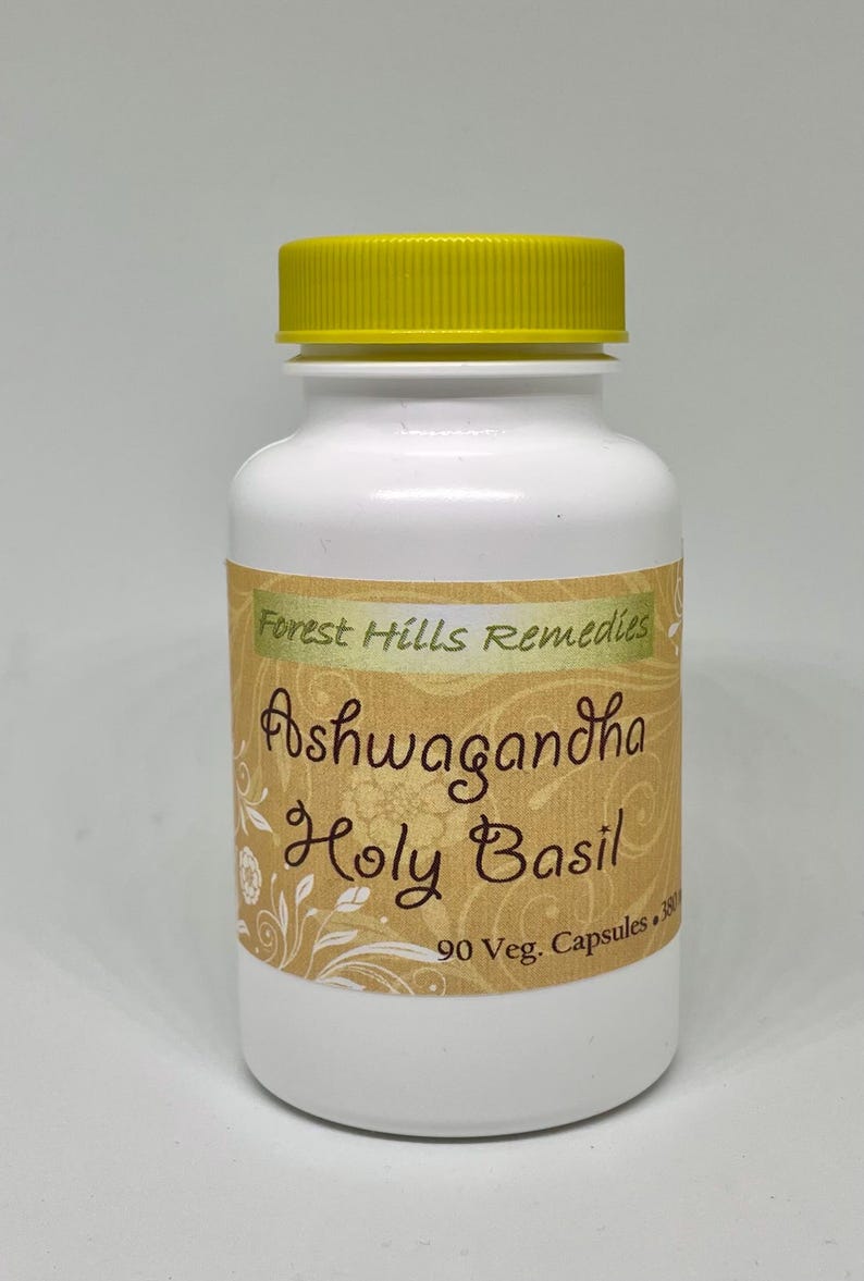 May include: White bottle with a yellow lid labelled "Forest Hills Remedies Ashwagandha Holy Basil 90 Veg. Capsules"