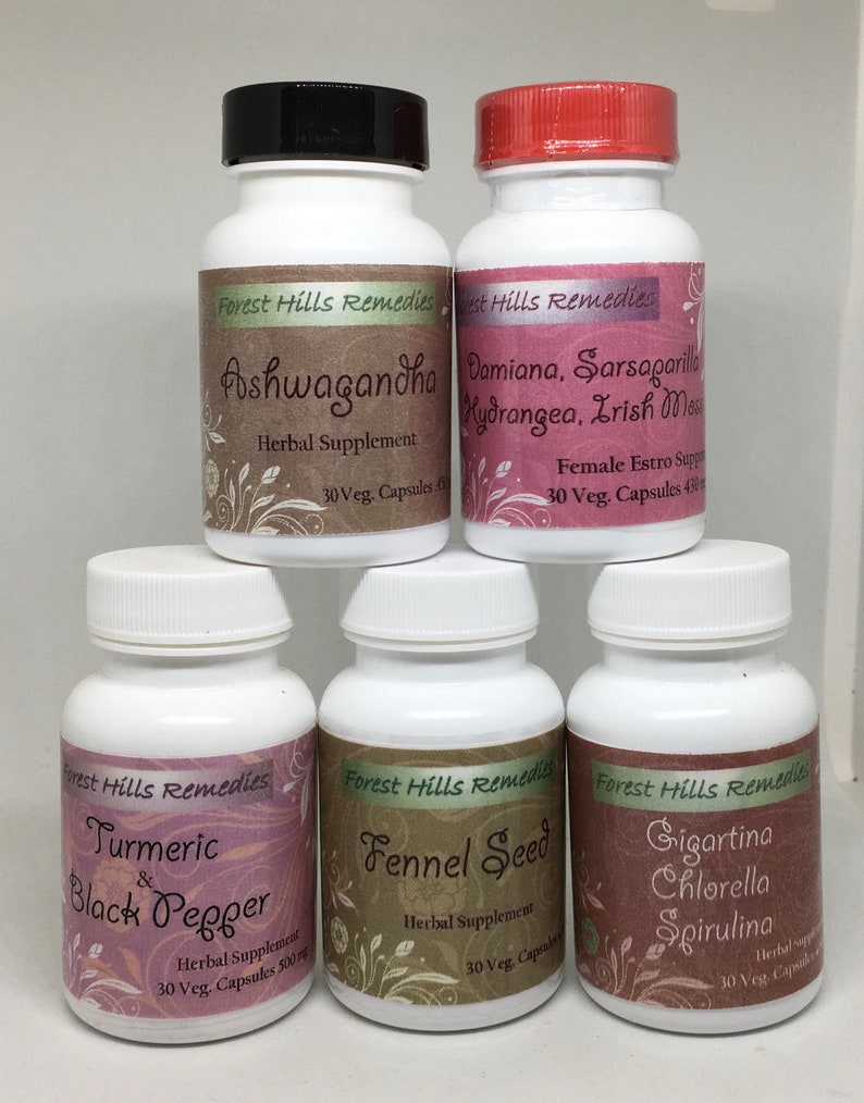 May include: Five white bottles with black lids and labels. The labels have a floral design and text that reads "Forest Hills Remedies" and the name of the herbal supplement. The supplements are Ashwagandha, Damiana, Sarsaparilla, Hydrangea, Irish Moss, Turmeric & Black Pepper, Fennel Seed, Gigartina Chlorella Spirulina.
