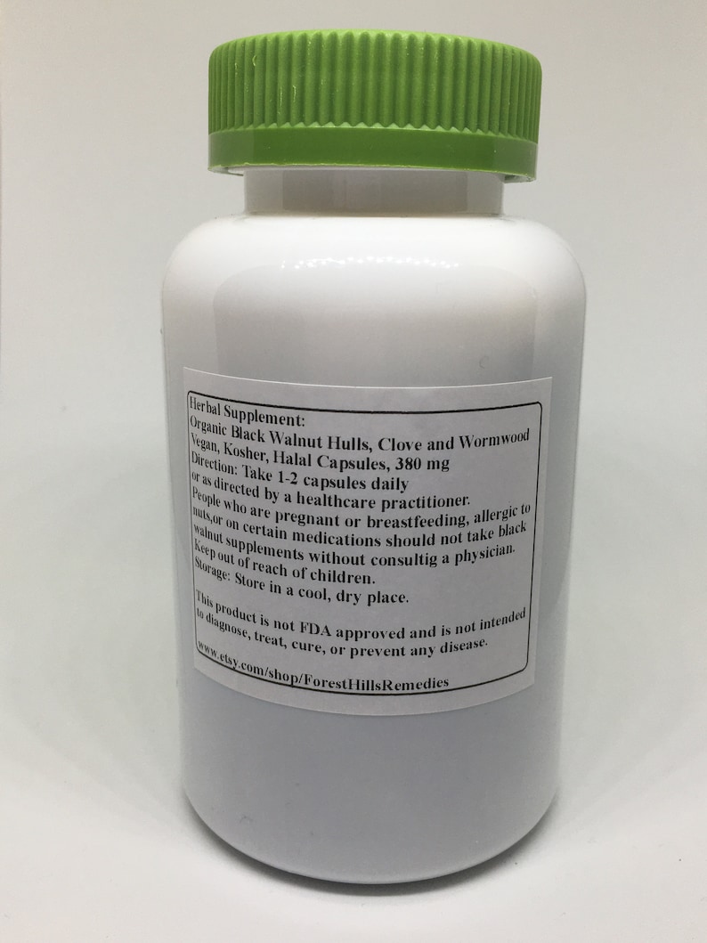 May include: White plastic bottle with a green lid, labeled "Herbal Supplement: Organic Black Walnut Hulls, Clove and Wormwood Vegan, Kosher, Halal Capsules, 380 mg Direction: Take 1-2 capsules daily or as directed by a healthcare practitioner. People who are pregnant or breastfeeding, allergic to nuts, or on certain medications should not take black walnut supplements without consulting a physician. Keep out of reach of children. Storage: Store in a cool, dry place. This product is not FDA approved and is not intended to diagnose, treat, cure, or prevent any disease. www.etsy.com/shop/ForestHillsRemedies"