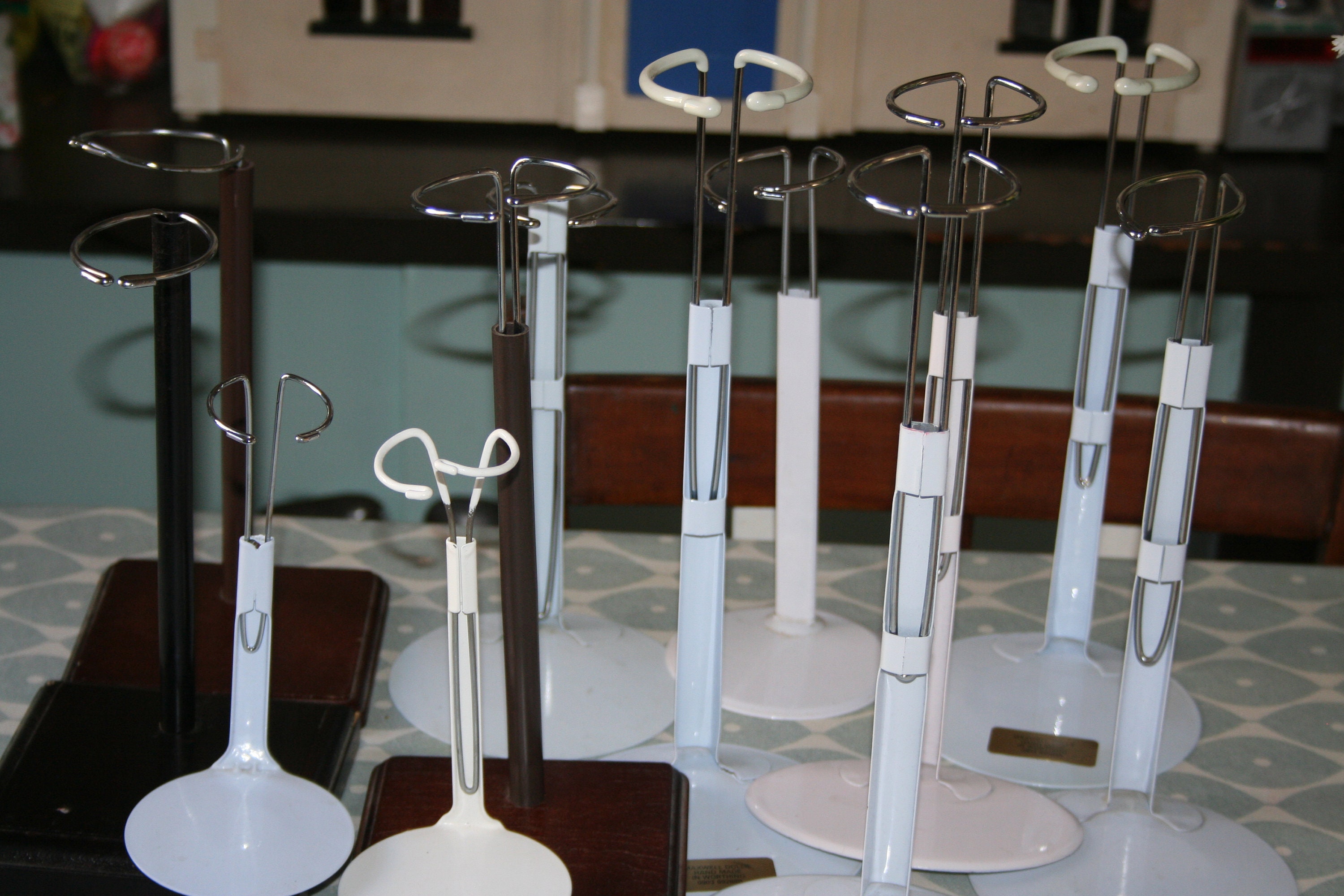 types of doll stands