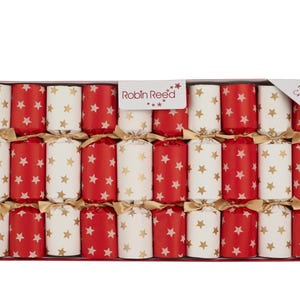 May include: A box containing 10 handmade Robin Reed crackers, each tied with gold ribbon. The crackers feature alternating red and white paper patterns, both decorated with small gold stars. The box includes the brand name and text 10 Handmade Crackers.