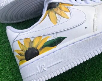 nike sunflower flip flops