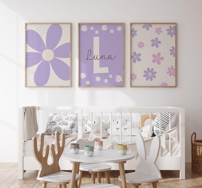 May include: Three framed prints with a purple and white floral design. The center print features the name "Luna" in a white font with a large white letter "L".