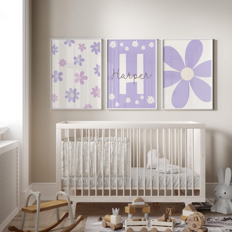 May include: Three purple and white floral nursery prints with the name "Harper" on one of the prints.