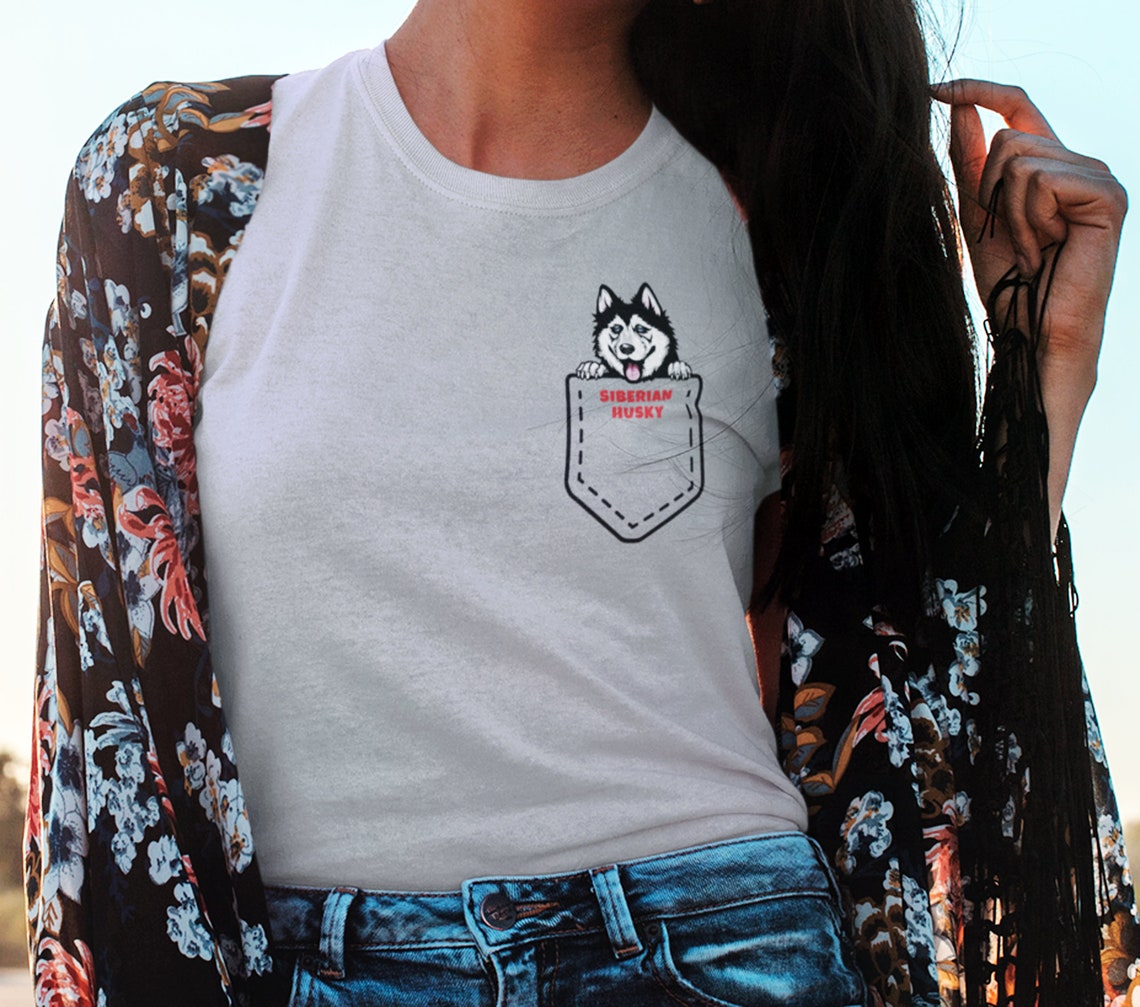 dog in a pocket t shirt