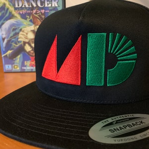 May include: A black and green baseball cap with a red and green logo that says "MD". The cap has a black brim and a silver tag that says "The Authentic Yupoong Snapback Yupoong Since 1974".