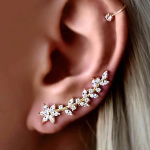 Örhängen med klätterörhängen • Klätterörhängen • GÅVOR till henne • Örhängen med klätterörhängen • Bladörhängen • Blomörhängen • Örhängen i 14K guld och silver