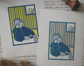 Woman reading. Hand printed linocut. Linocut hand printed.