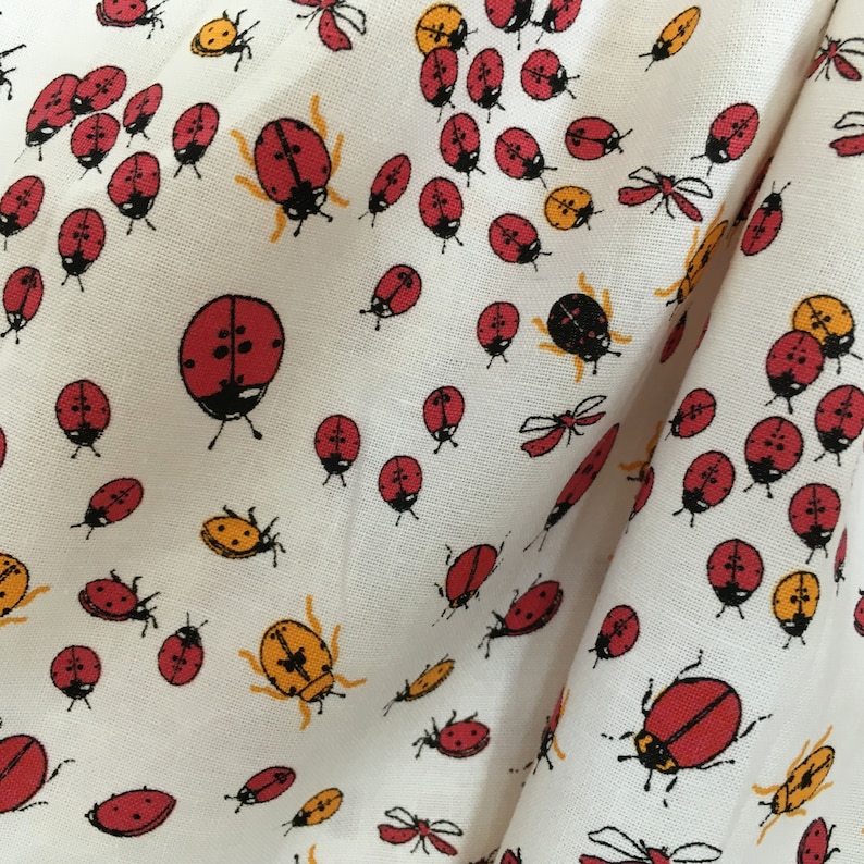 Handmade girls summer dress for ages 2-3 years in ladybird cotton fabric and adjustable straps