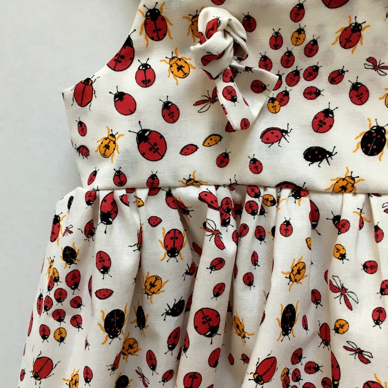 Handmade girls summer dress for ages 2-3 years in ladybird cotton fabric and adjustable straps