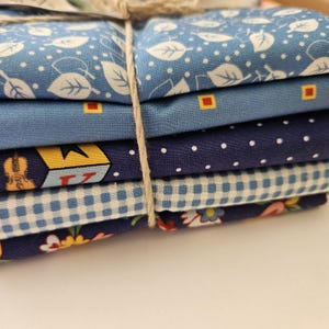 Fat Quarters Bündel aus 100% Baumwolle eine Vielzahl an hochwertigen Stoffen zum Patchworken, Quilten und Nähen. Farblich abgestimmt oder kuratiert aus der Stoffkollektion