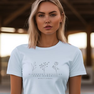 Olika förmågor samma mänsklighet t-shirt