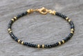 beaded bracelet, black bracelets for women, dainty black gold bracelet, tiny black bracelet, minimalist black bracelet, thin beaded bracelet product logo
