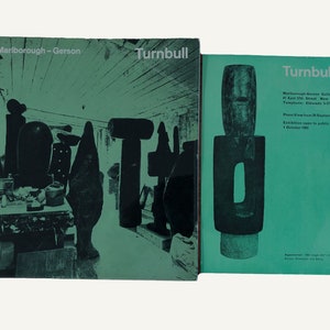 May include: Two green book covers with the title "Turnbull" and the text "Marlborough-Gerson Gallery Inc. 41 East 57th Street, New York 22 Telephone: Plaza 3-3711" on the right cover. The left cover features a black and white photograph of sculptures in a studio.