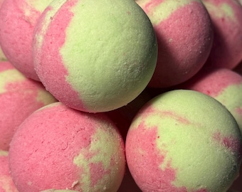 Multicolor bath bomb red/green color with a dragon fruit fragrance.
