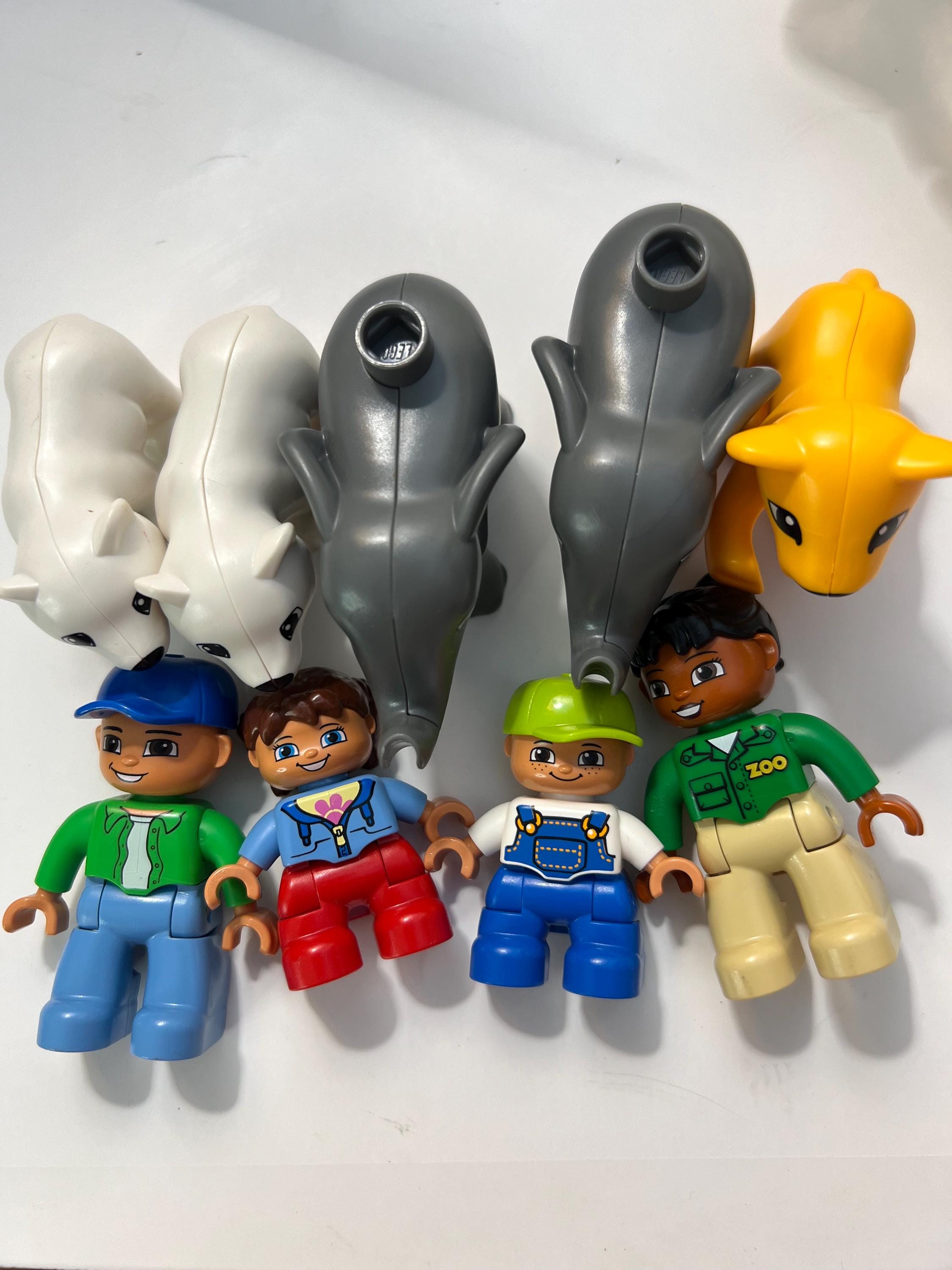 Lot of 9 Lego Duplo 2-2.5” Figures Four People, Two Polar Bears, Two Elephants and Lion Cub