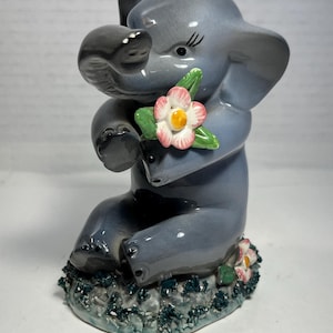Vintage Ceramic Trunk Up Gray Elephant Holding a Flower, Made in Italy
