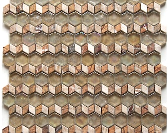 May include: A sheet of beige and brown mosaic tiles with a honeycomb pattern. The tiles are made of glass and marble.