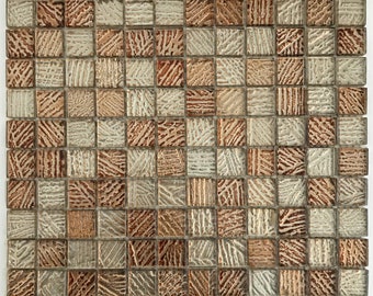 May include: Square mosaic tiles in shades of brown, beige, and cream. The tiles have a textured, patterned surface, creating a visually interesting design. The mosaic is arranged in a grid pattern, suitable for various interior design applications.