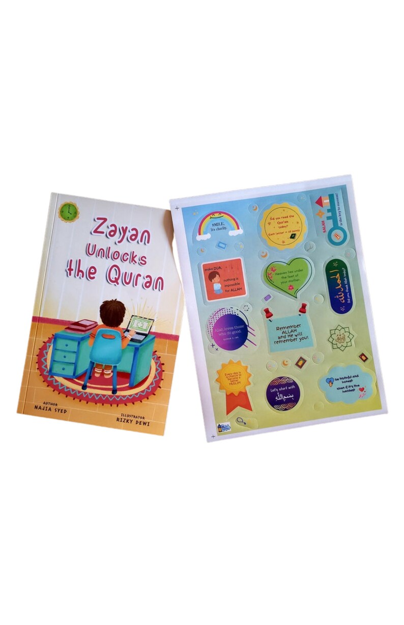 May include: A colorful book titled "Zayan Unlocks the Quran" with a cartoon illustration of a boy sitting at a desk using a laptop. The book is accompanied by a sheet of stickers with various Islamic-themed designs and Arabic text.