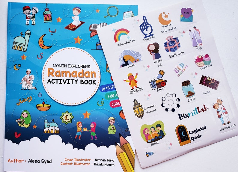 May include: A blue and white activity book with the title "Momin Explorers Ramadan Activity Book" and a sticker sheet with illustrations of Islamic symbols and phrases. The sticker sheet includes images of a crescent moon, a mosque, a lantern, and a hand with a raised index finger.