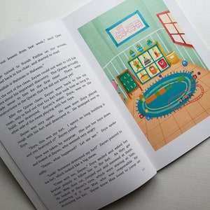 May include: A colorful illustration of a child's playroom with a blue rug, a bookshelf with toys, and a window. The text "Bismillah-ir-Rahman-ir-Raheem" is visible on the page.