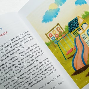 May include: An open book with an illustration of a colorful playground with a slide, swings, and a sandbox. The text on the page reads "Chapter 5 Cleanliness".